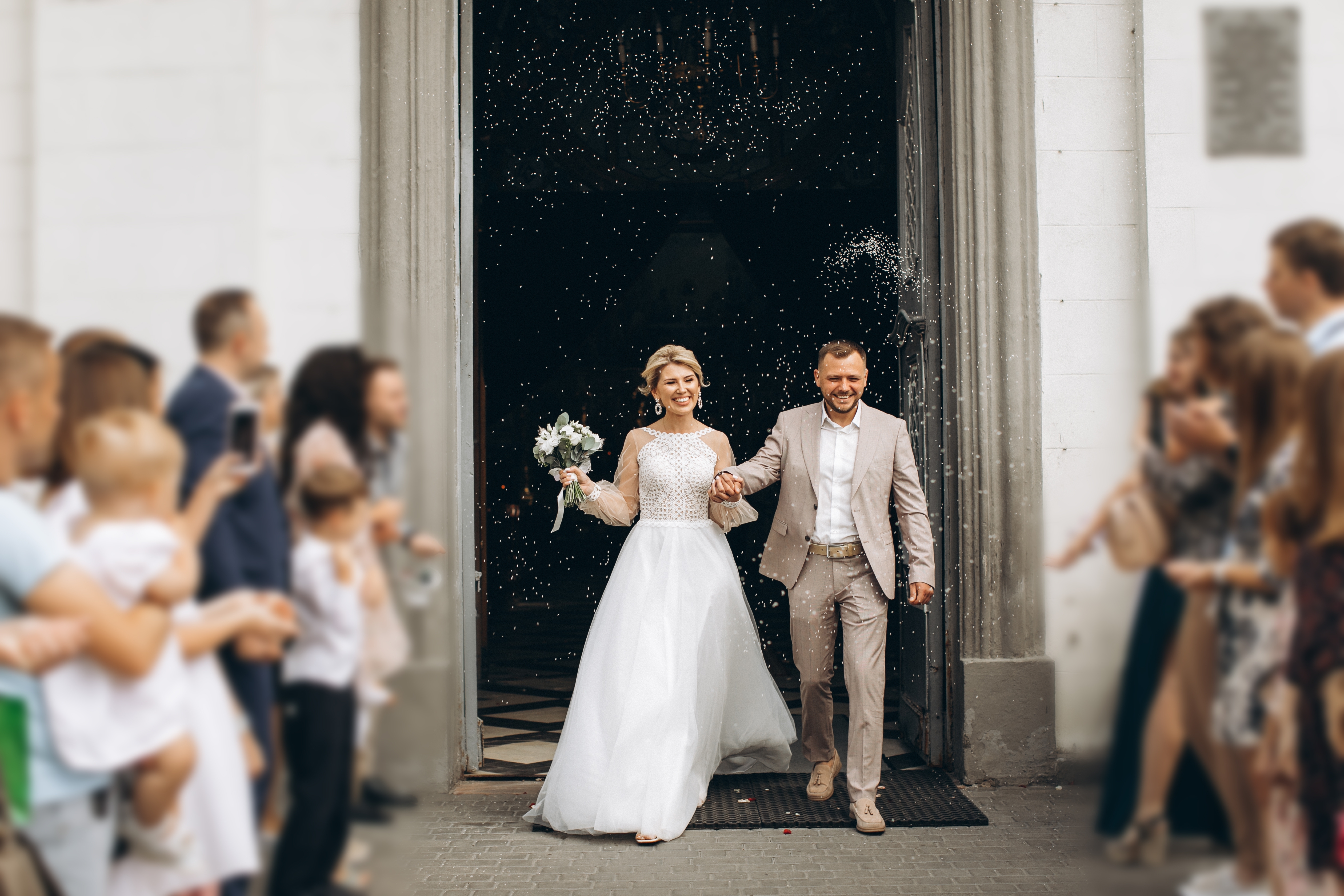 Smiling,And,Happy,Young,Married,Couple,Leaving,Church,After,Marriage.