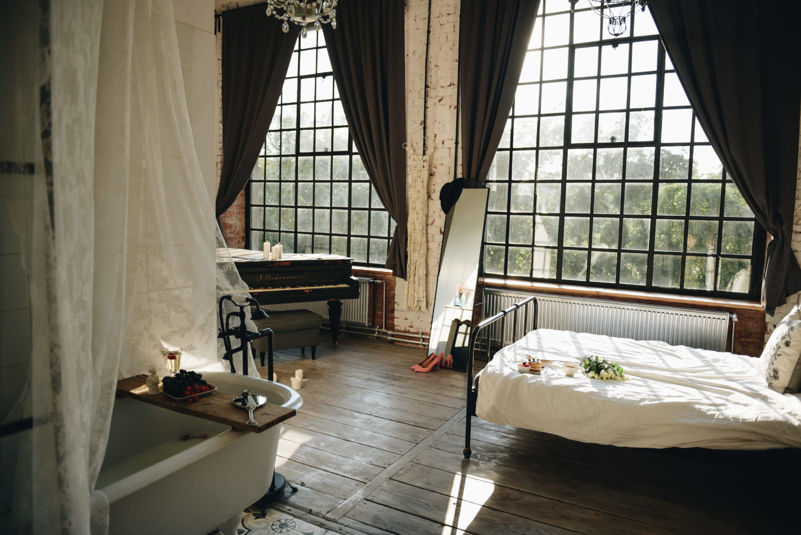 Piano room with a freestanding bathtub, boudoir photographer Warsaw